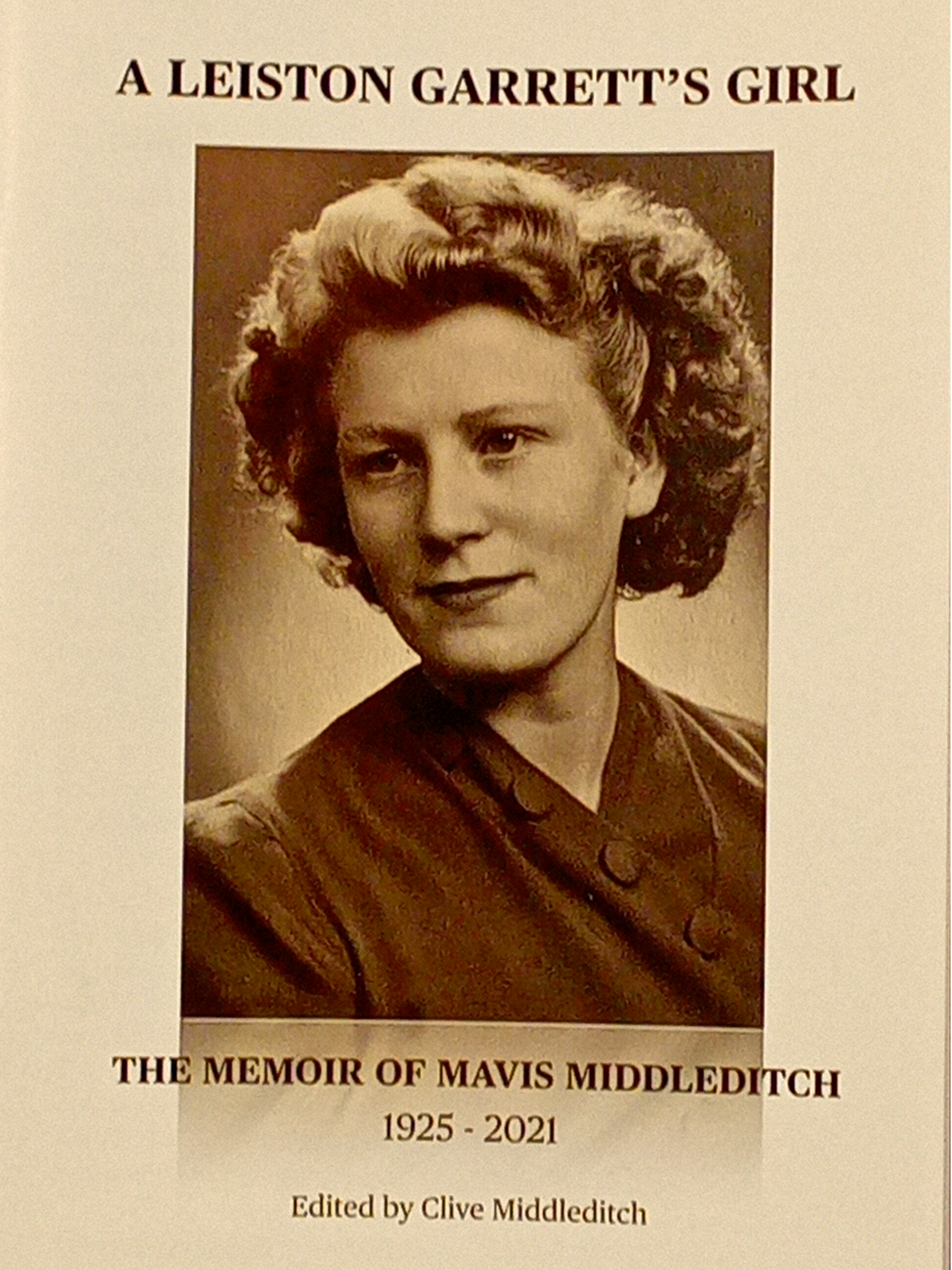 Book cover of 'A Leiston Garrett's Girl' with a portrait of a woman on the cover.